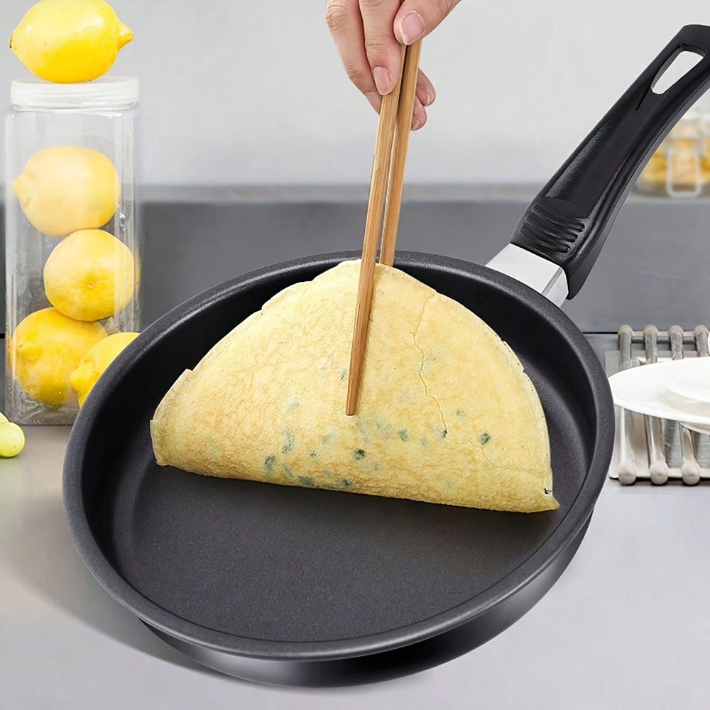 This versatile non-stick frying pan is perfect for cooking eggs, steak, and breakfast dishes. It can also be used for barbecue and other kitchen tasks. The pan is oil-free and smoke-free, making it a great addition to any household. It is suitable for