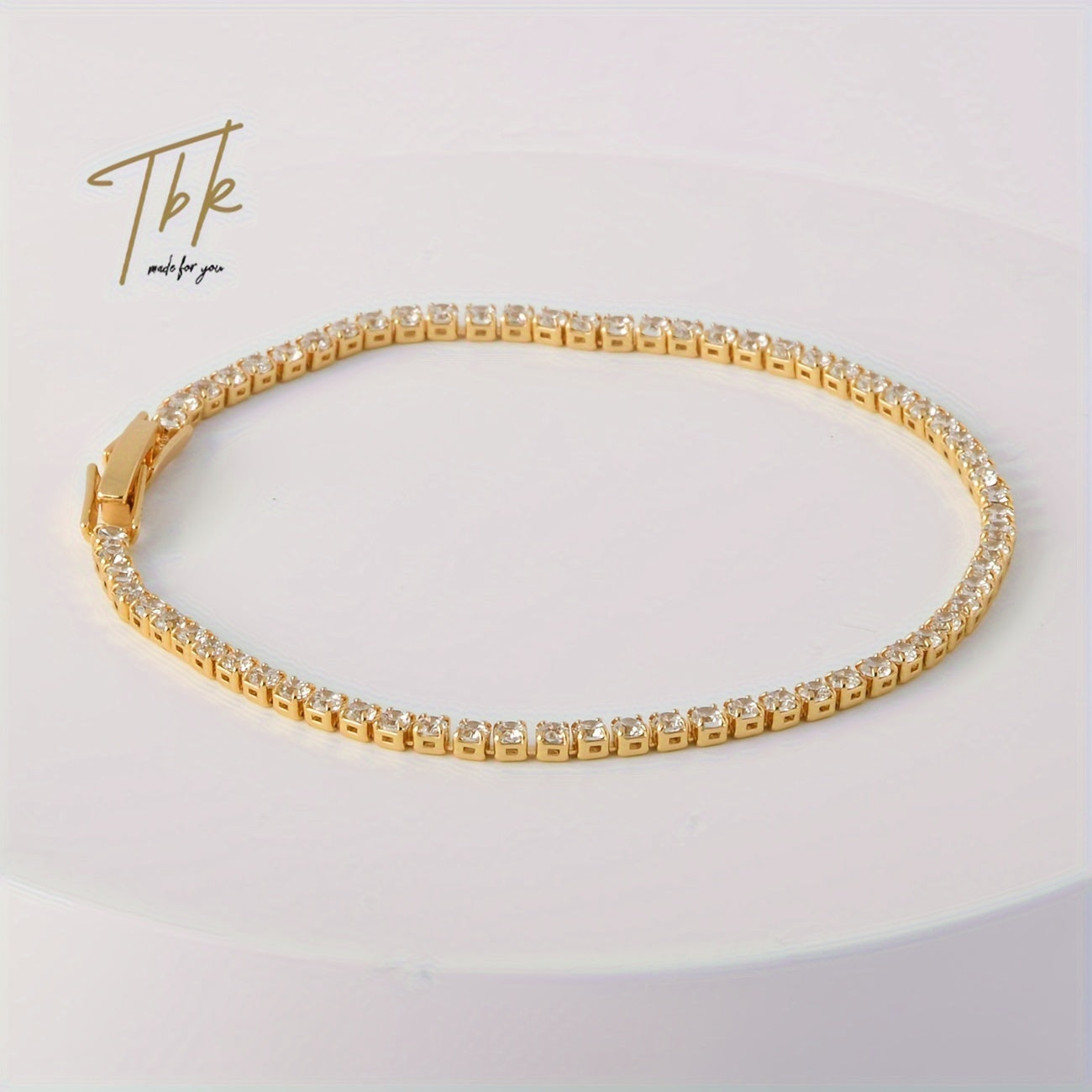 Ice up with this dazzling zirconium-studded tennis bracelet made of shiny titanium steel, presented in a gift box for an extra touch of luxury.