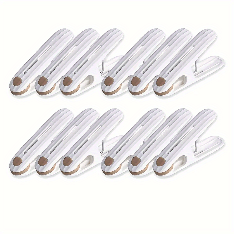 A set of 12 windproof clothespins for air drying clothes, socks, and underwear. Can also be used as fixed pins for clipping household items. These small clips are made of plastic and are also great for sealing food and snack bags, holding photos, and