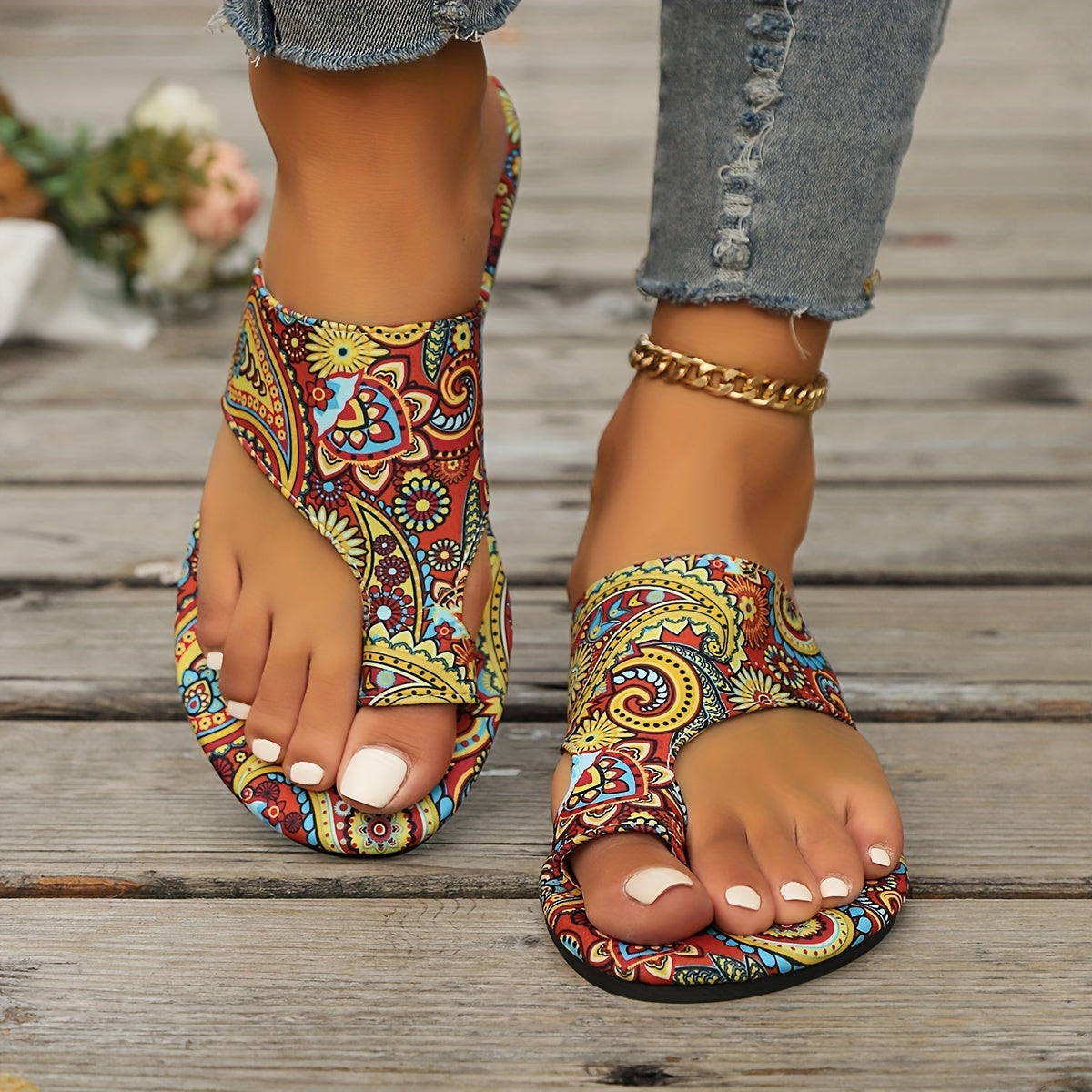 Sporty and stylish slip-on sandals with a floral design for women.