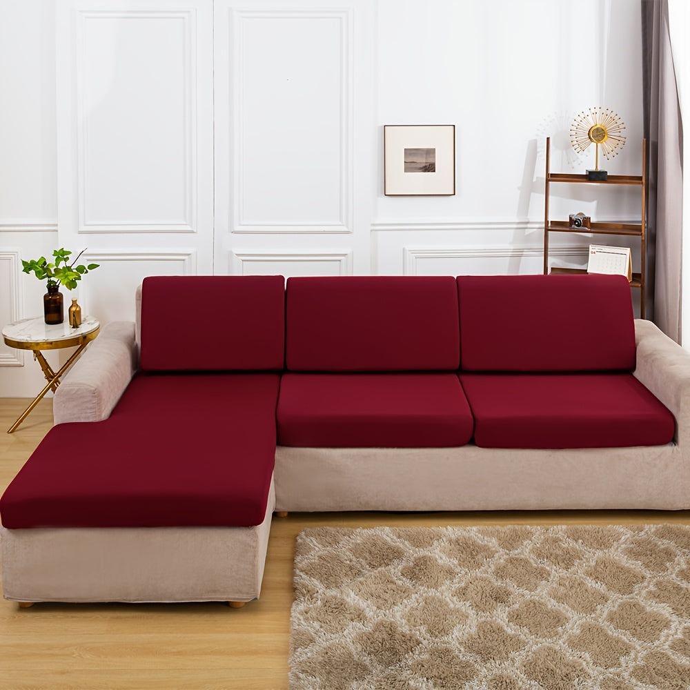 Stretch sofa seat cover to protect living room cushion.