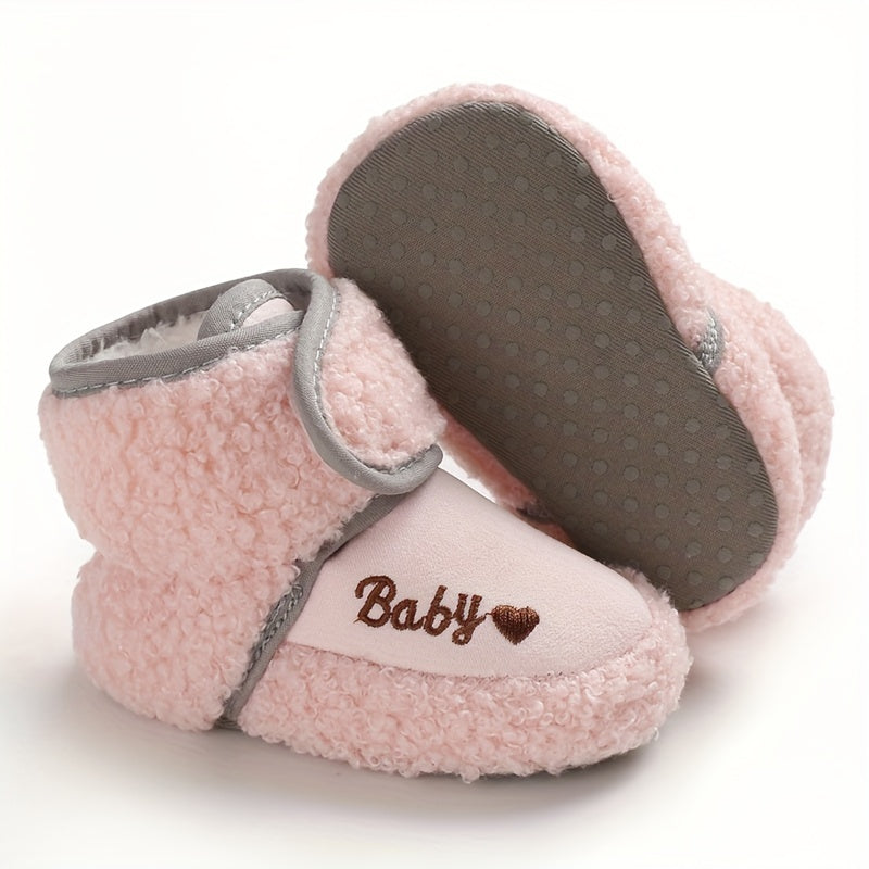 Cozy boots for baby boys and girls, featuring hook and loop fasteners for indoor and outdoor winter walks.