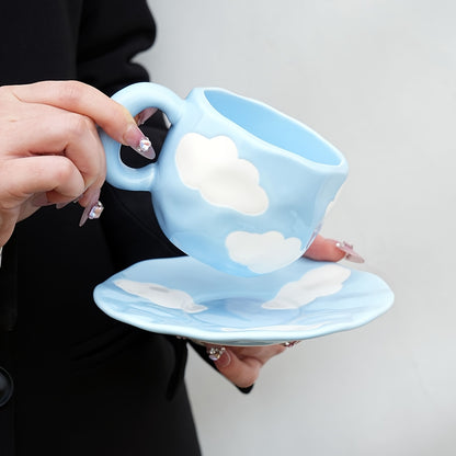 Cloud-shaped ceramic coffee mug with saucer - reusable, handwash only, ideal for breakfast & office use - great gift idea.