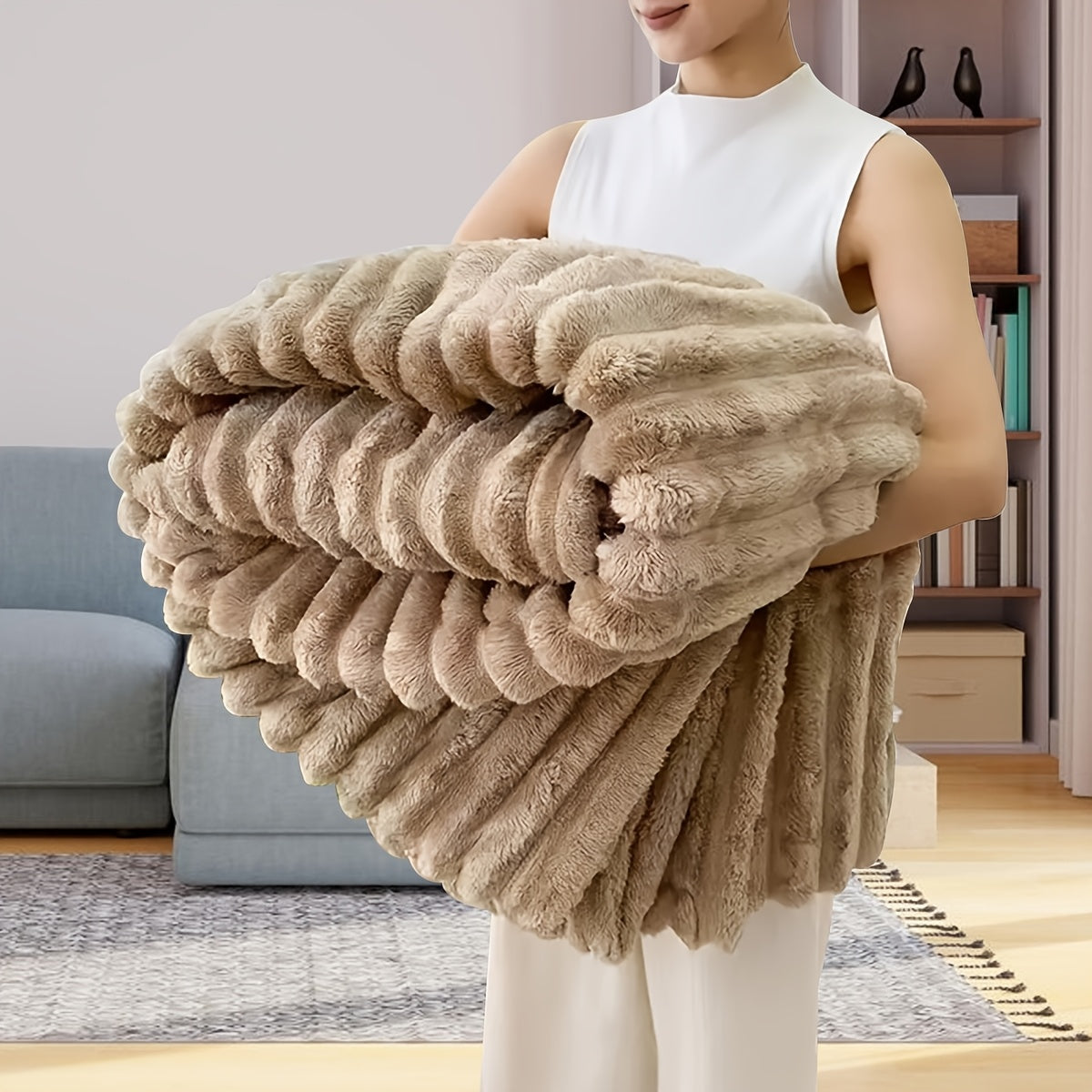 Upgrade your comfort with this dual-sided striped fleece throw blanket. The ribbed texture adds a touch of luxury, while the cozy and warm material makes it perfect for any season. Whether you use it for naps, in the office, or in the bedroom, this