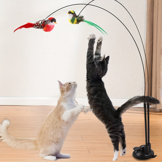 Cat toy set with cartoon pattern, feathers, bell, and adhesive base; no batteries required.