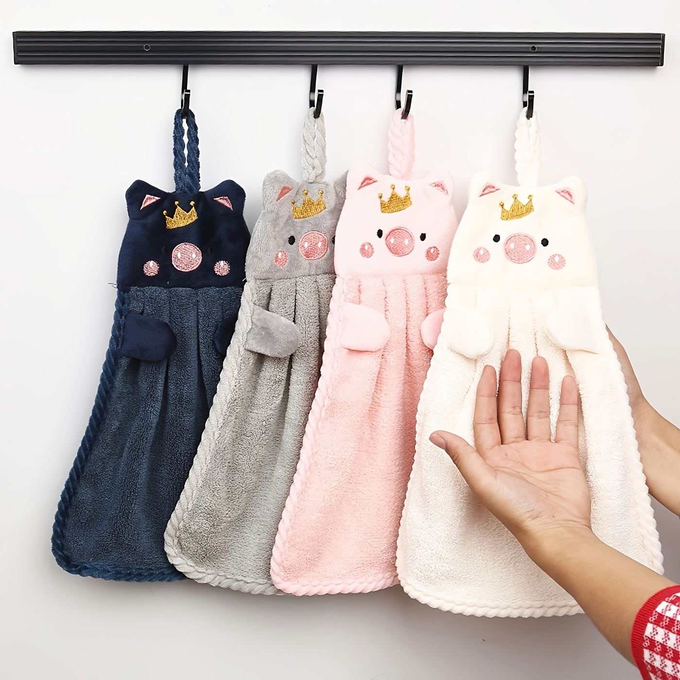 Cute pig hand towel for household use, absorbent and versatile.