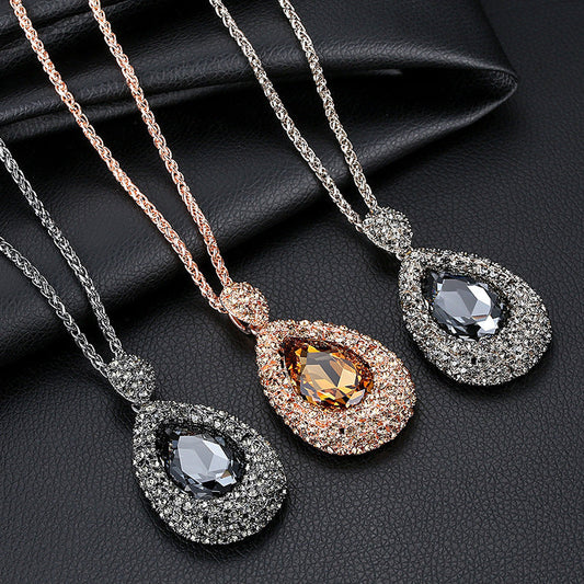 Elegant vintage-inspired silver plated pendant enhancer, featuring a rhinestone mosaic in a water drop design, perfect for women's necklaces. This stylish jewelry accessory is ideal for everyday wear in a boho fashion.