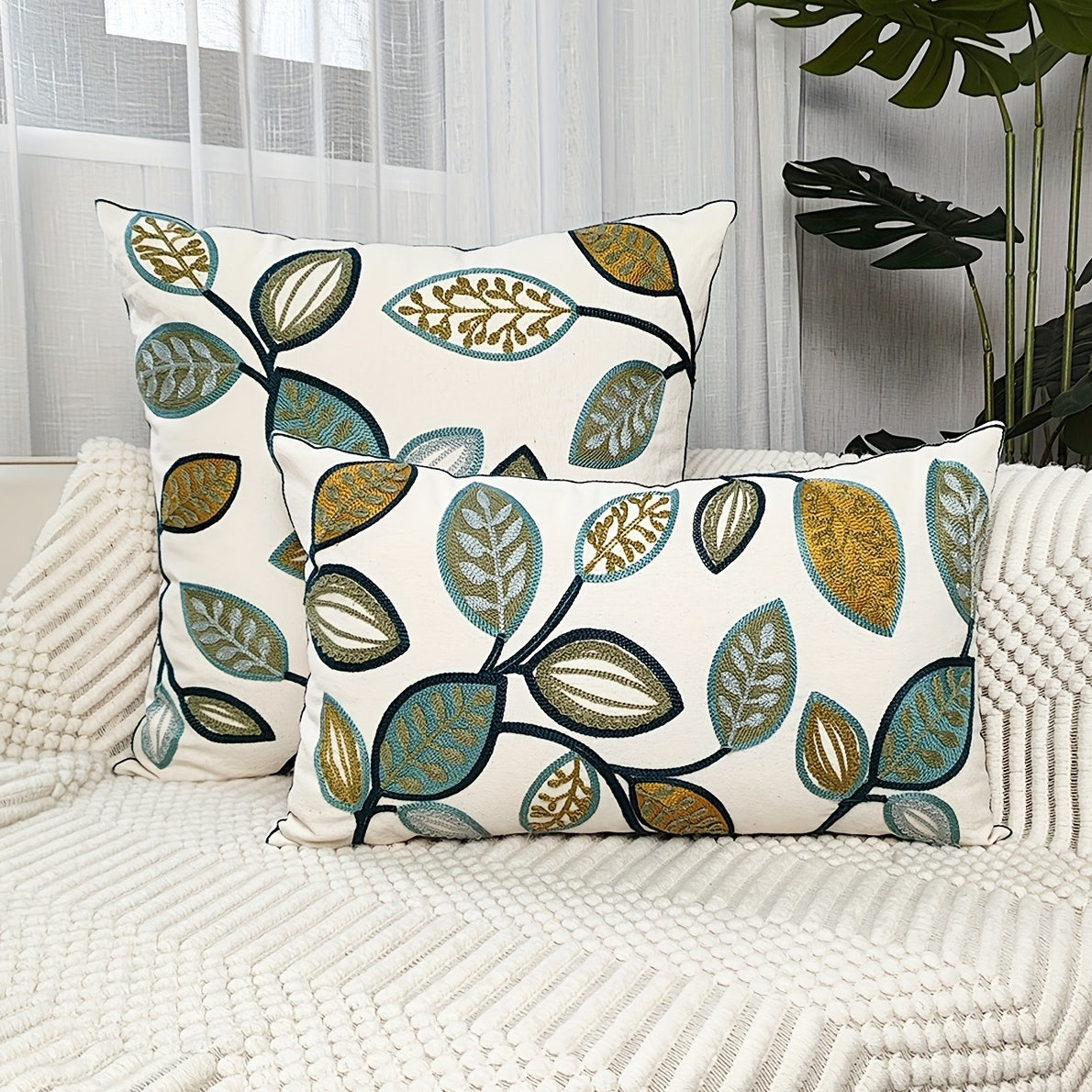 Leaf embroidered canvas throw pillow case featuring modern green & golden leaf pattern, zippered, machine washable cover for living room decor.