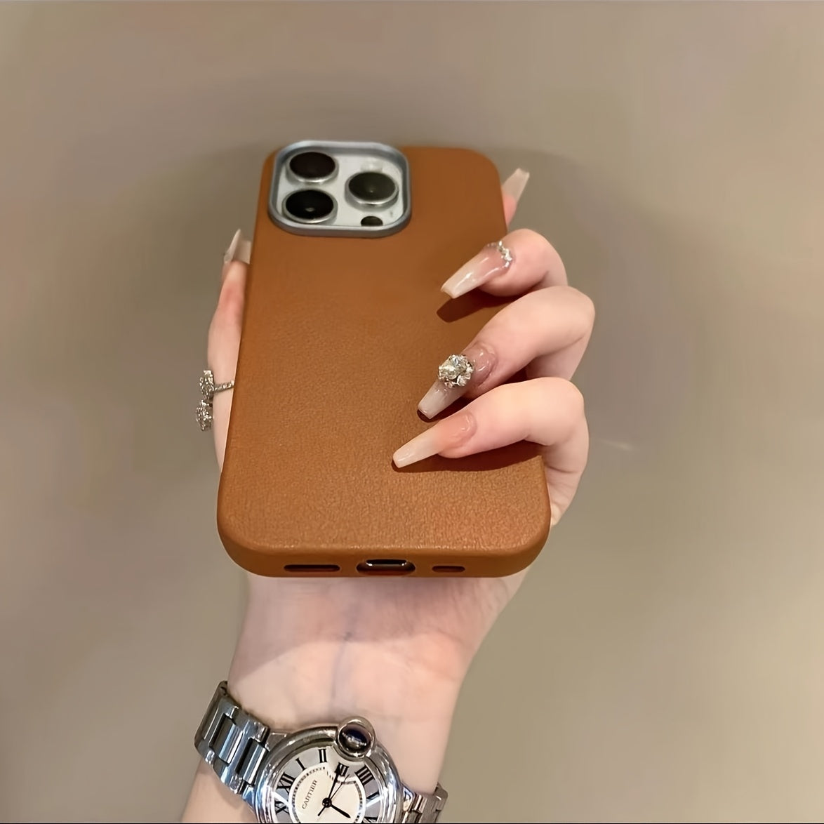 Simple design artificial leather pattern mobile phone case for iPhone models 7 and up.