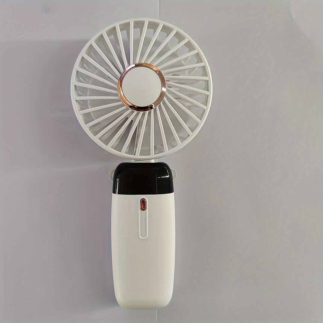 1 piece of USB Handheld Fan - A mini portable desktop folding small fan with a digital display. An essential summer item for back to school, RV outdoor camping, picnic, office, and travel.