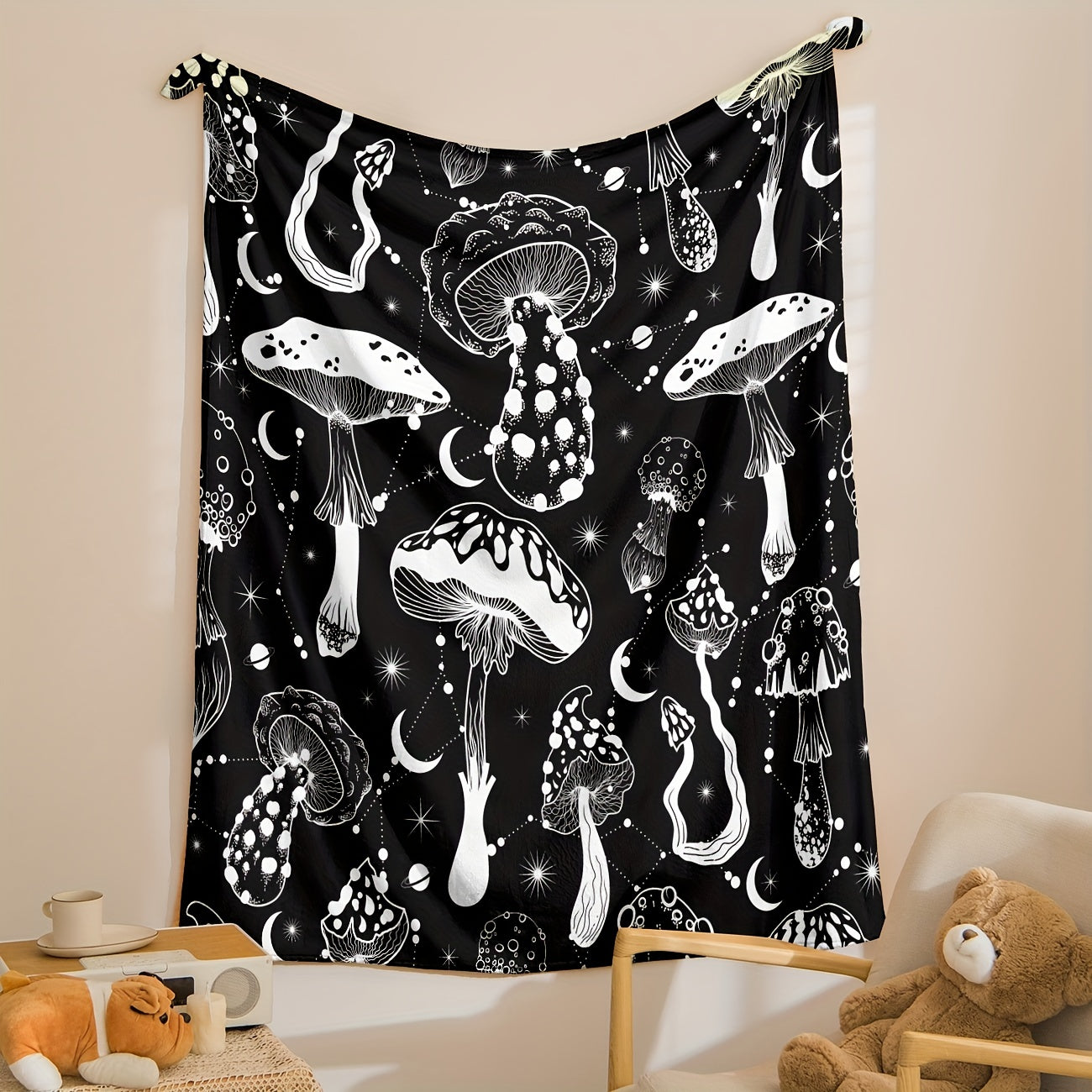 Stay cozy with this stylish Black and White Mushroom Patterned Flannel Blanket, perfect for naps, snuggling, or keeping warm. This versatile and lightweight blanket is a great gift for the home, providing comfort in the living room, bedroom, office, or