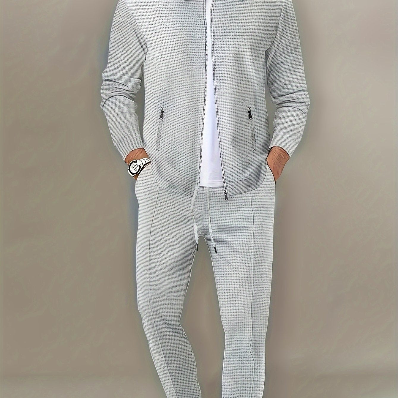 Men's 2-piece outdoor outfit: Solid long sleeve zip-up jacket with zipper pockets and pants.