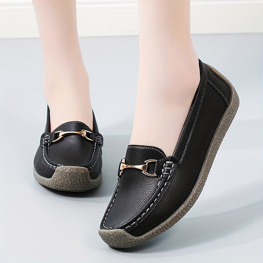 Flat loafers with buckle decoration for women made of soft faux leather, featuring a solid color and slip-on style with a casual design.