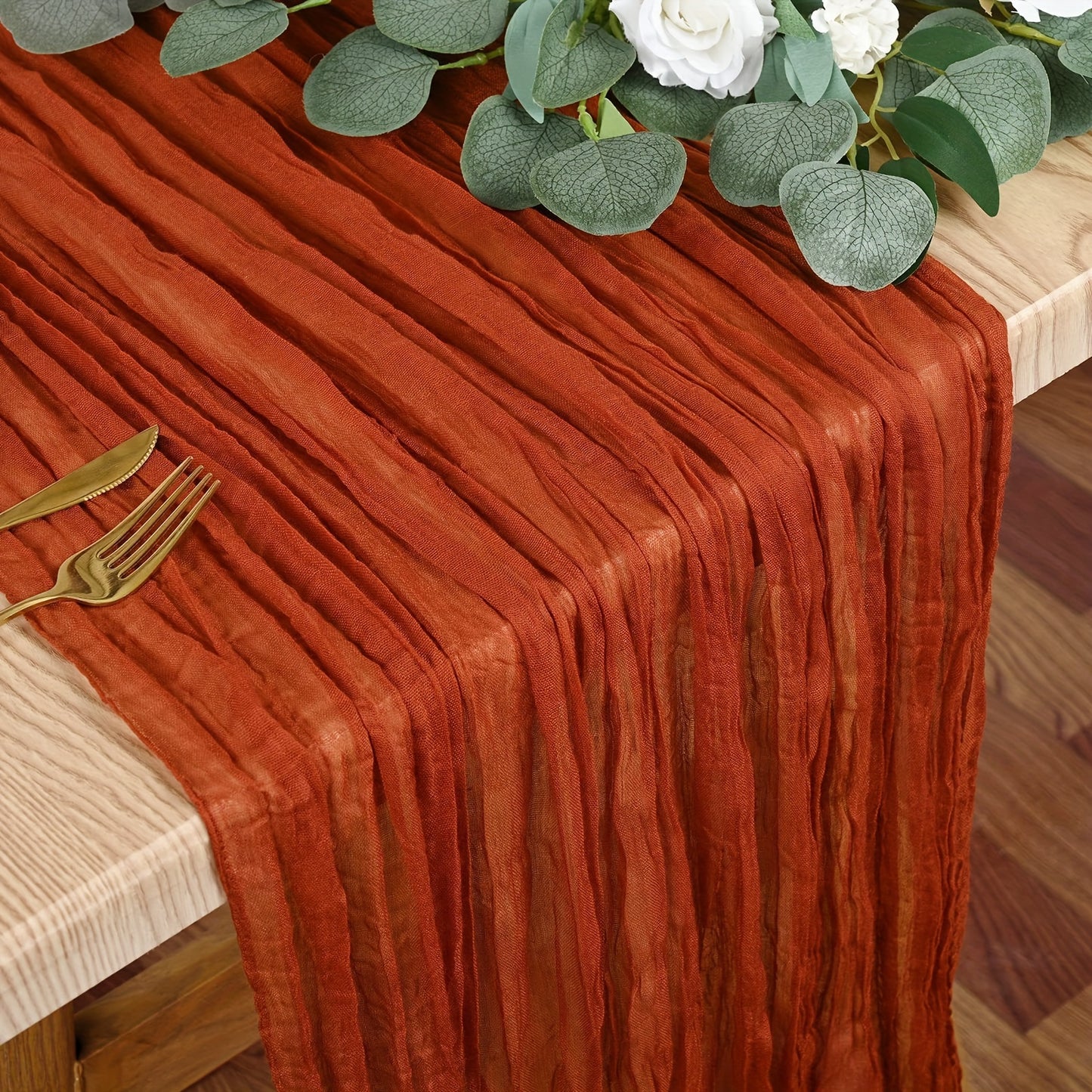 Elegant rust-colored cheesecloth table runner for spring, holidays, weddings - farmhouse chic design.