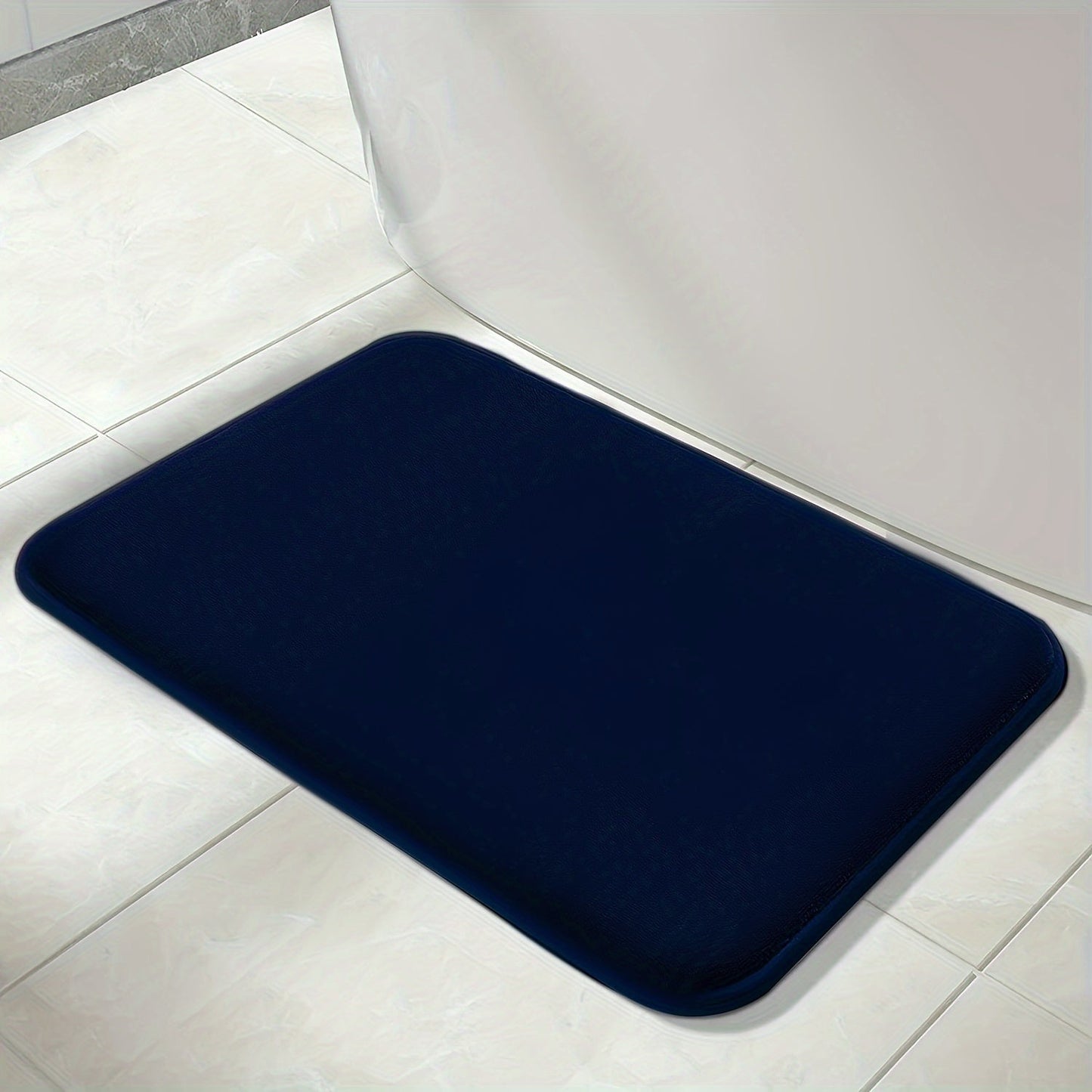 One set of three extended memory foam bath mats featuring a durable non-slip design. Set includes a U-shaped mat, toilet lid cover pad, and cozy bathroom decor for bedroom and living room. Suitable for use in spring, summer, autumn, and winter with a