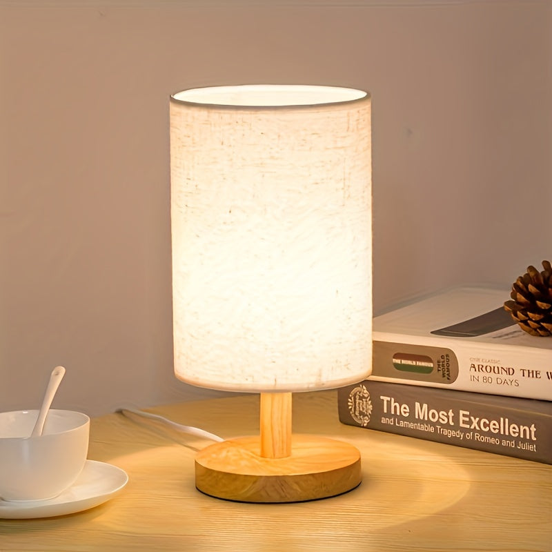 Modern solid wood table lamp with creative LED light, ideal for bedroom, study room, and guest house decor. Features natural wooden base.