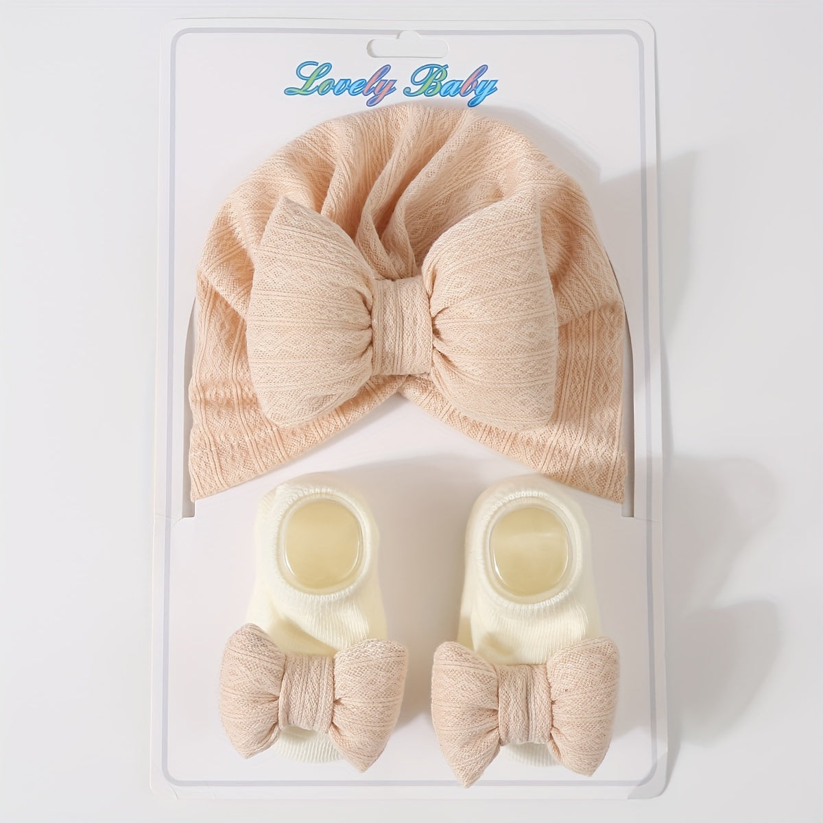 Newborn knit fleece bow hat and sock set, perfect for Thanksgiving, featuring cartoon theme. Breathable and suitable for girls aged 0-3 years.