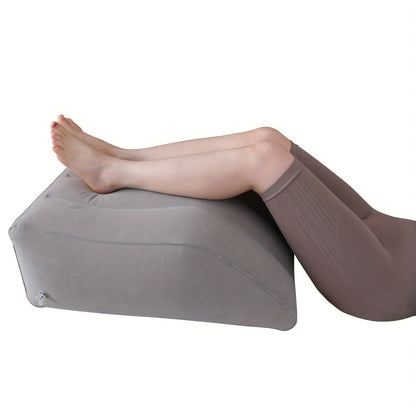 Elevate your legs with the Inflatable Leg Elevation Pillow to improve circulation and reduce swelling. This pillow is stain-resistant, with a medium soft firmness and non-textile cover. Ideal for post-surgery recovery, knee, and back pain relief. Spot