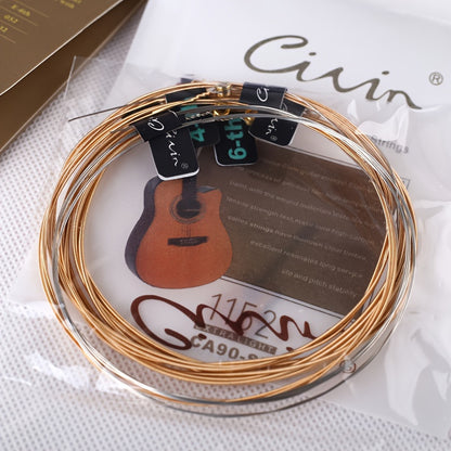 Acoustic folk guitar strings with carbon steel and phosphor copper coating, rust-resistant, high-quality packaging, 6 strings, bright sound, smooth feel, ideal for stage performance.