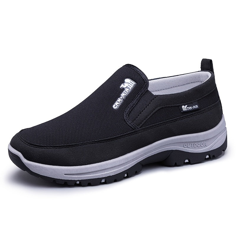 Men's slip-on sports sneakers with breathable fabric upper, round toe, and faux sole for daily wear and running.