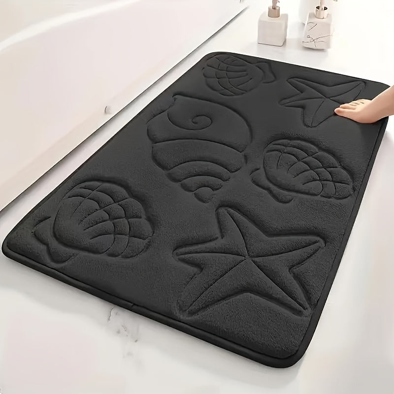 High-density 25D sponge bath mat with ultra-soft starfish and shell embossing, offering super absorbency and non-slip properties. Ideal for bathtubs, showers, and home decor. This bath accessory features high-frequency embossing for a touch of elegance