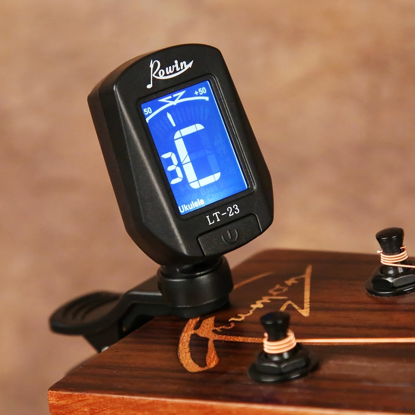 Clip-on tuner for all stringed instruments - acoustic & electric guitars, bass, violin, ukulele, mandolin, banjo - chromatic modes, durable ABS material, battery powered.