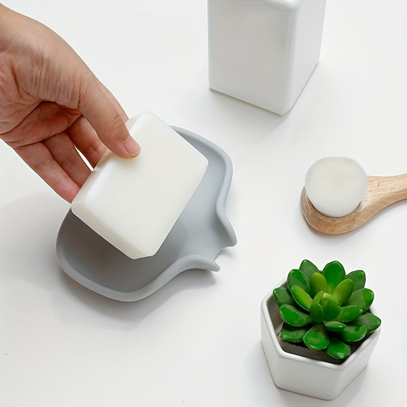 Simple soap dish for bathroom with minimalist design to hold and drain soap.