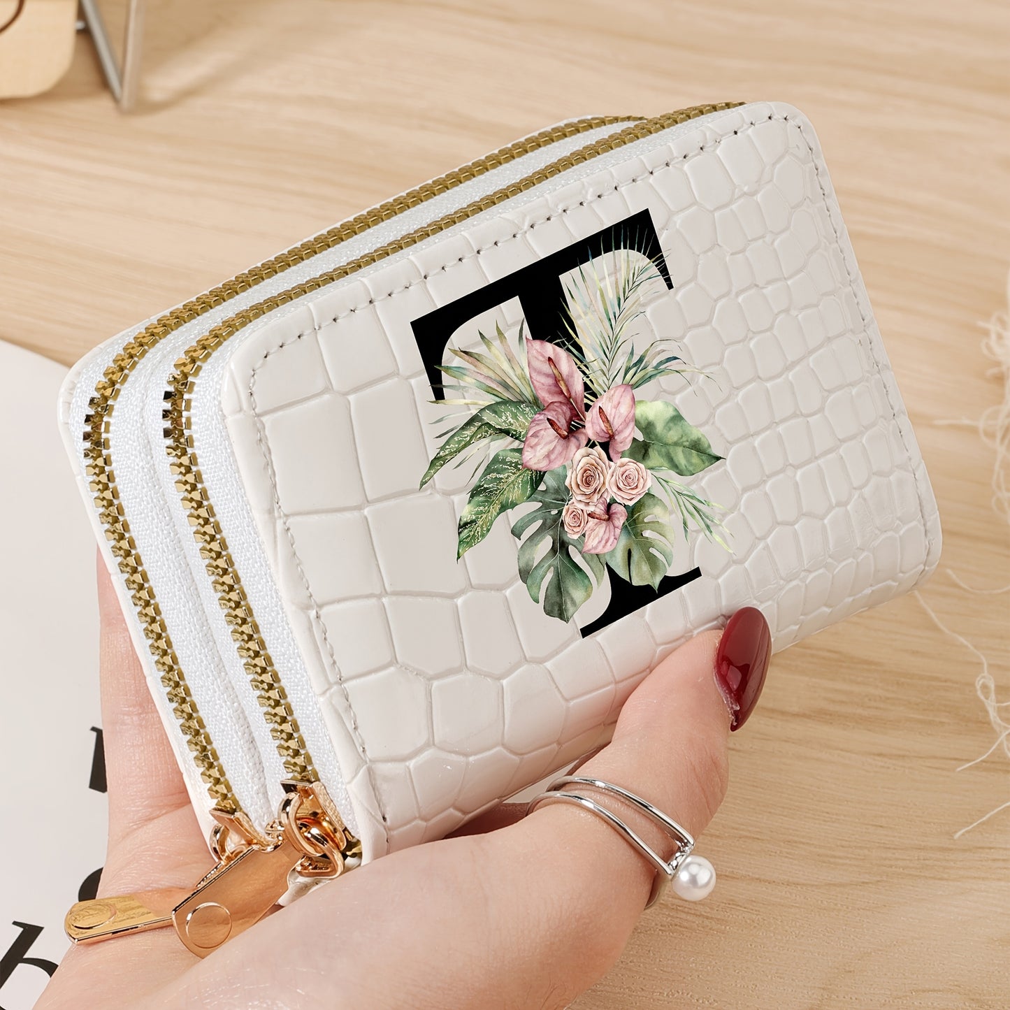 Women's credit card wallet with elegant floral letter print in black & white. Features large capacity, dual zipper, crocodile texture PU, lightweight design with nylon lining for everyday