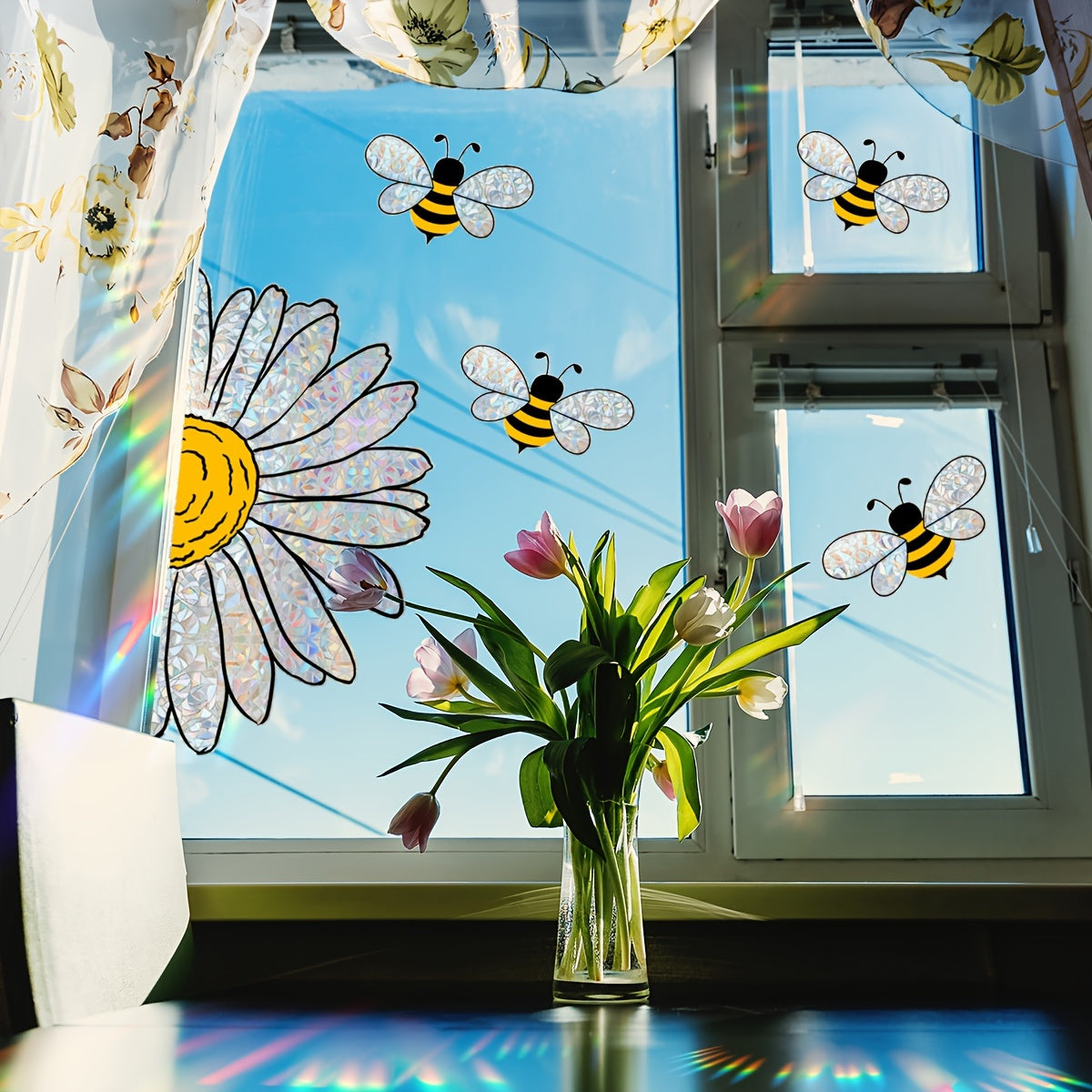 Bring a touch of spring to your home with this Sunflower & Bee Window Cling! Measuring 30.48cm x 40.64cm, this reusable electrostatic glass decal features double-sided colorful designs that make perfect home decor accents.