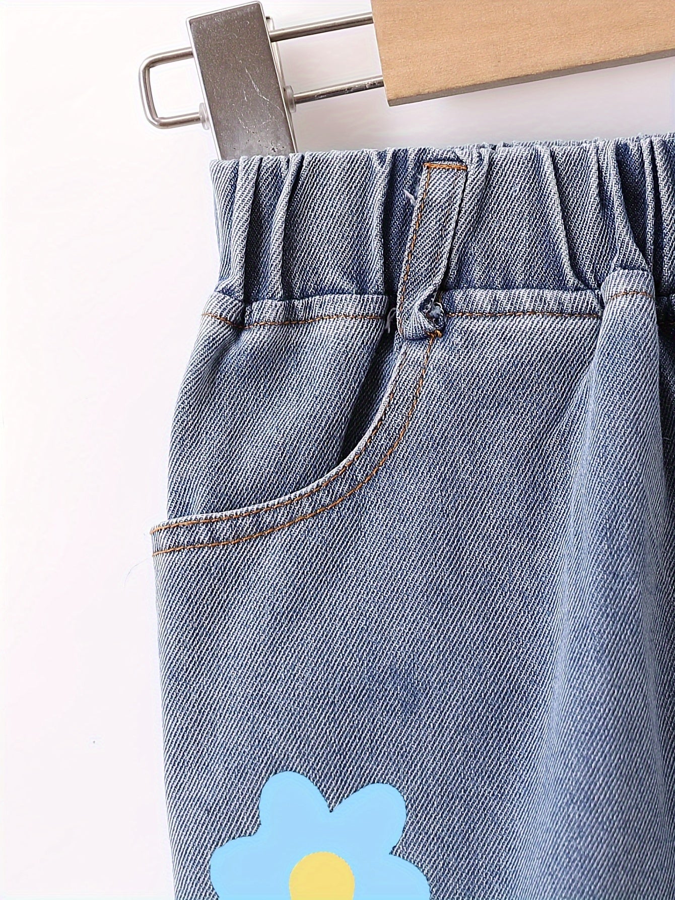 Girls' floral wide-leg denim jeans with elastic waistband, perfect for spring and autumn outdoor wear.