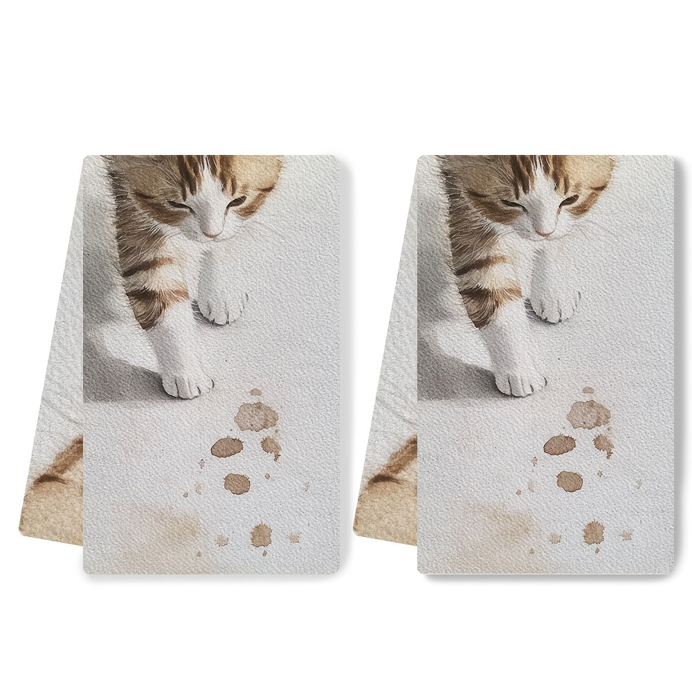 2 pieces of ultra soft kitchen towels, featuring the delicate steps of a kitten as it tiptoes. These highly absorbent dish hand towels are perfect for holiday decor. They are machine washable and measure 16x24 inches. Item number: 2KYSYS1218474