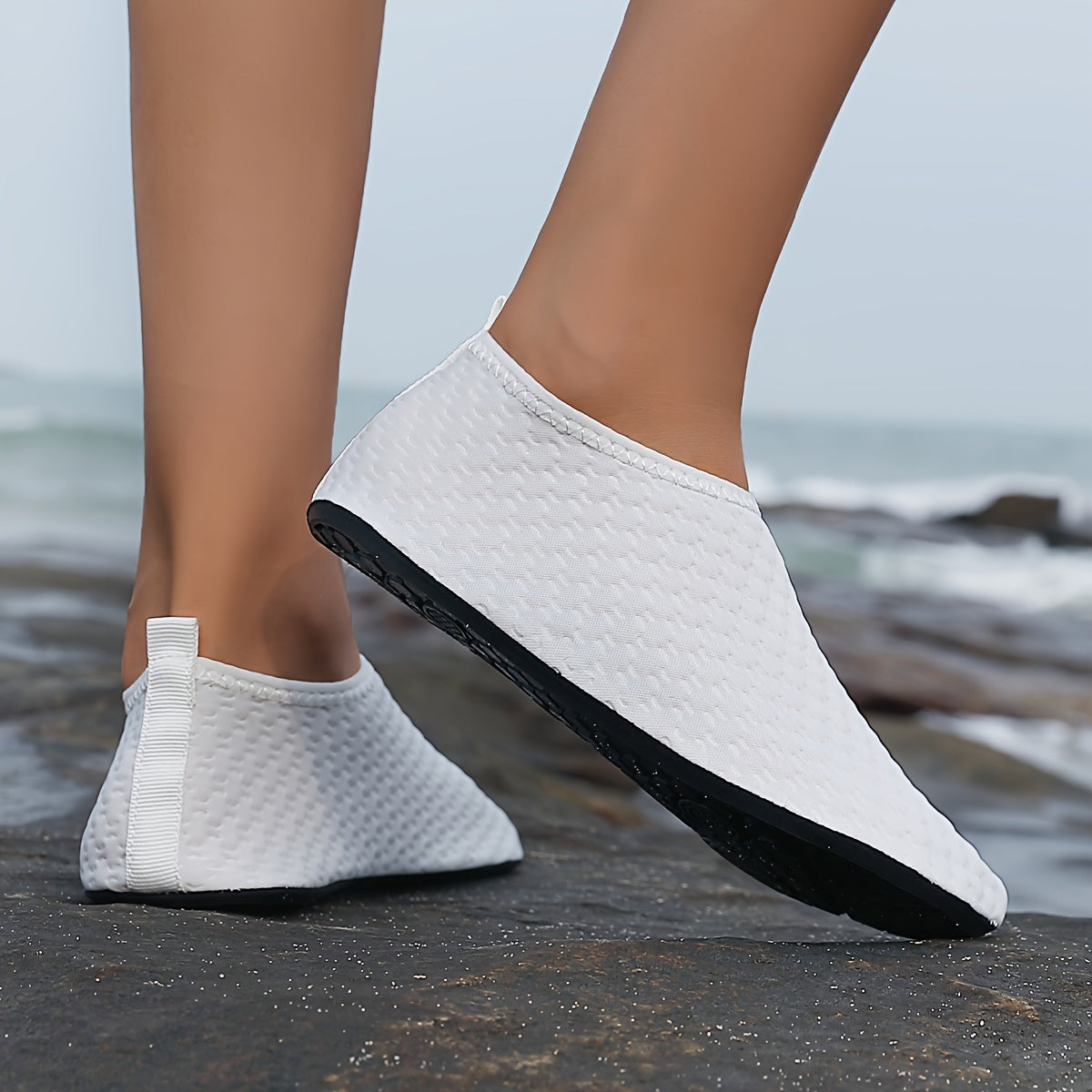 Durable slip-on water shoes for women, perfect for swimming, surfing, boating, fishing, and beach activities.