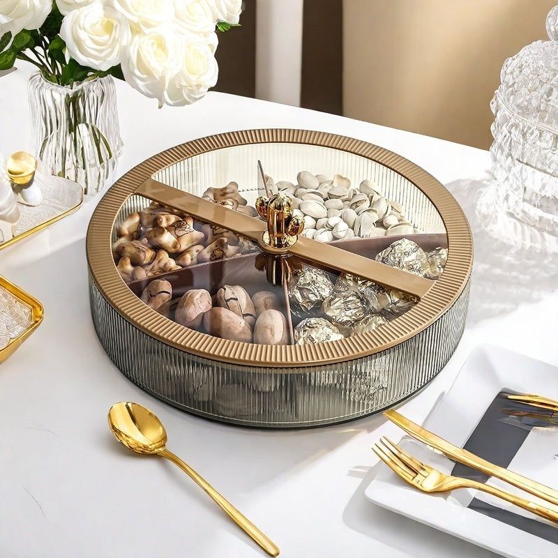 Airtight snack tray with lid for storing nuts and dried fruits in a round plastic container.