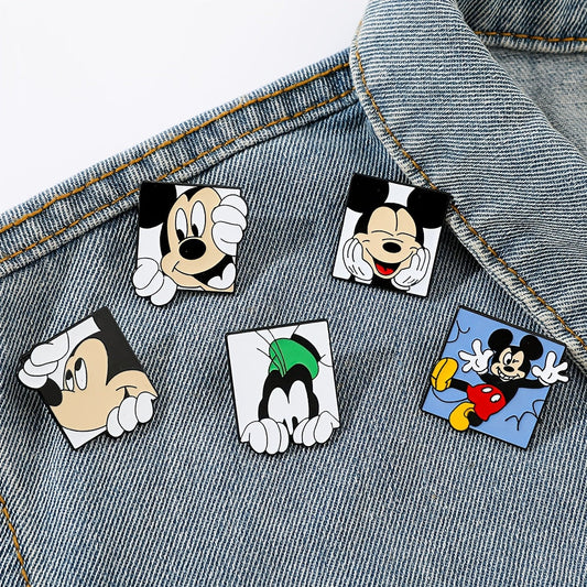 Set of 6 enamel brooch pins featuring adorable animal shapes such as Mickey Mouse and friends. Made of high-quality alloy metal, these cute and minimalist badges are perfect for adding a fun touch to your clothing and backpack.