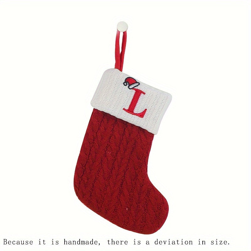 11" Christmas stocking with knitted alphabet design, perfect for hanging on the Xmas tree or using as a gift bag. Made of polyester.