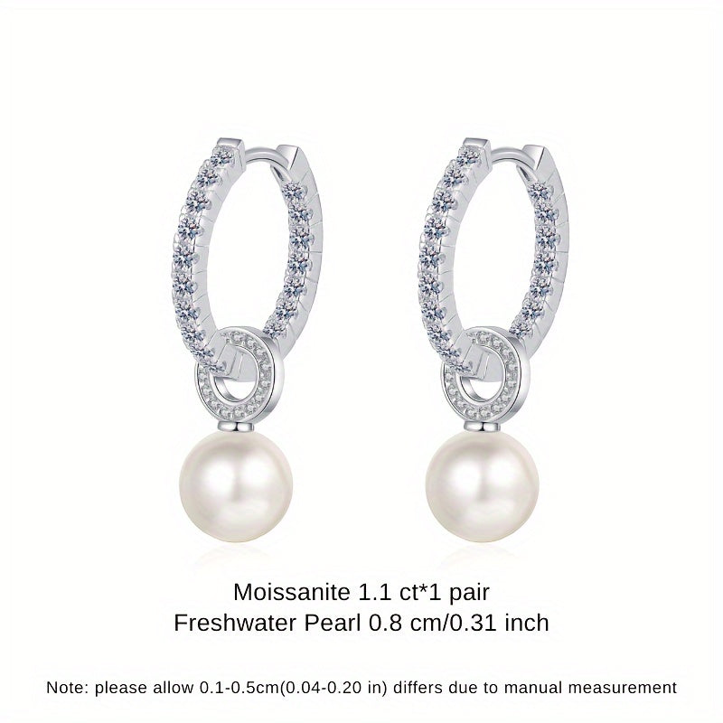 Elegant Shavano Drop Earrings featuring a 1.1 Carat Moissanite & Freshwater Pearl, crafted in 925 Sterling Silver. These earrings are perfect for weddings and gift-giving. They are inlaid with a secure clasp and weigh 4.7g.