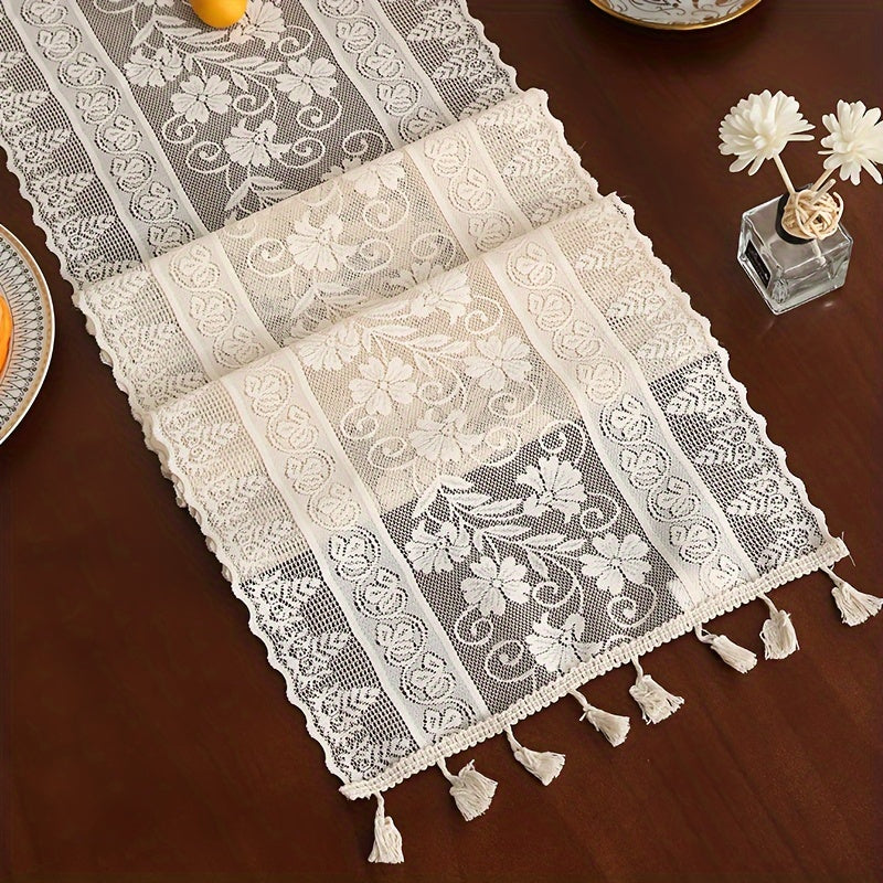 Long boho-chic lace table runner in farmhouse style, ideal for dining and bedroom decor, made of polyester blend.