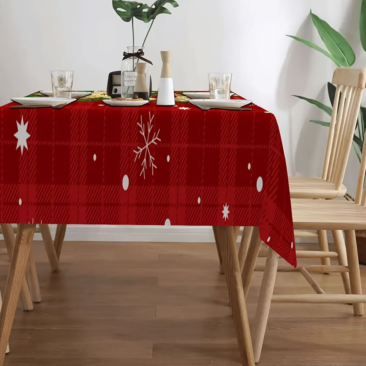 Stain-resistant party tablecloth with festive holiday design, machine washable and easy to clean.