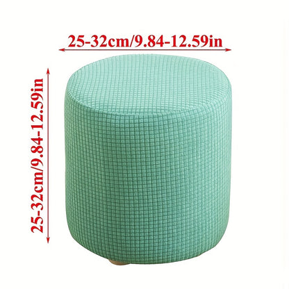 Stretchable round footstool cover made from soft polyester blend with elastic fit. Available in multiple colors, machine washable, modern design for living room ottomans.