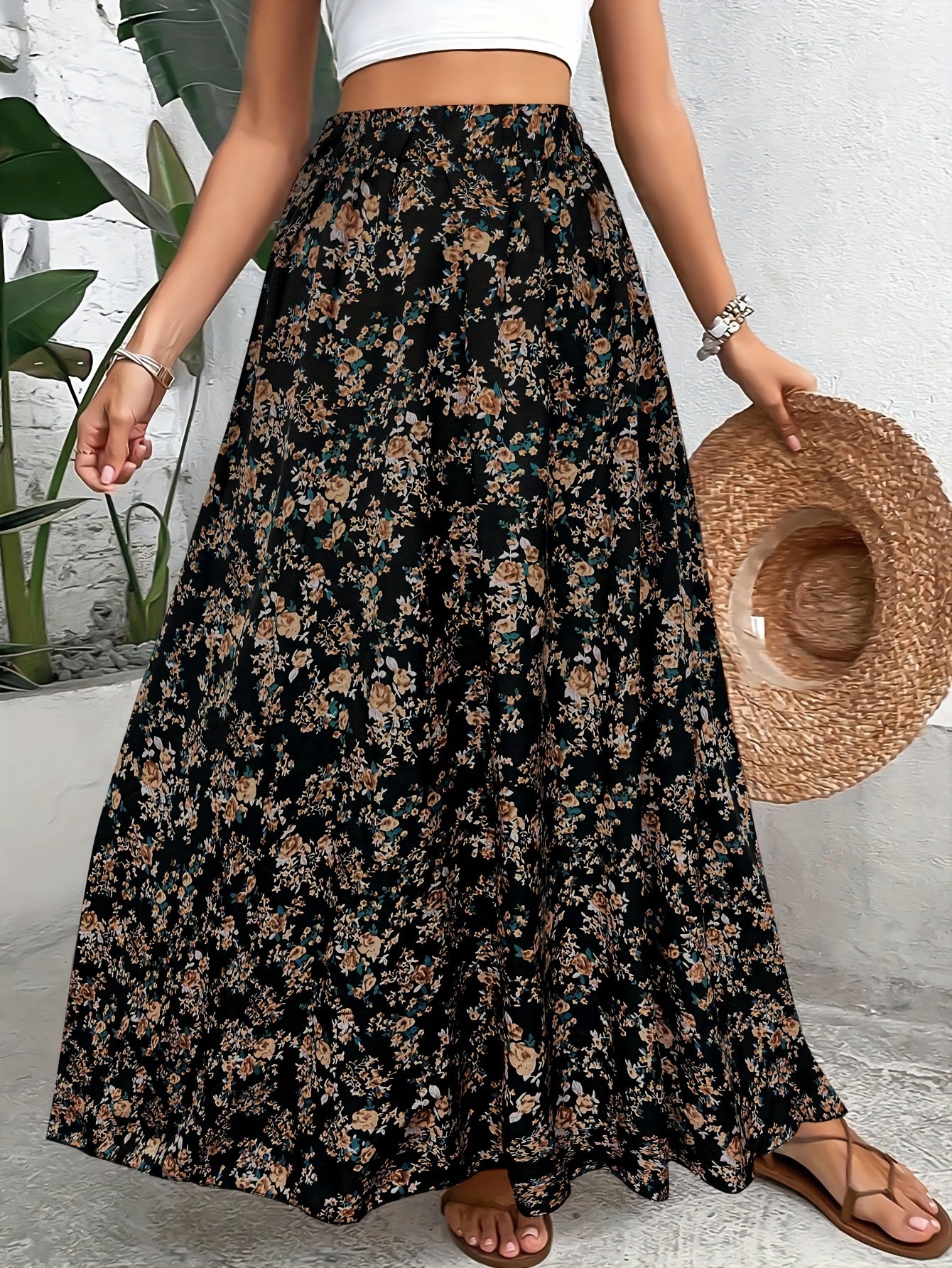 Bohemian style long skirt with small floral design and elastic waist.