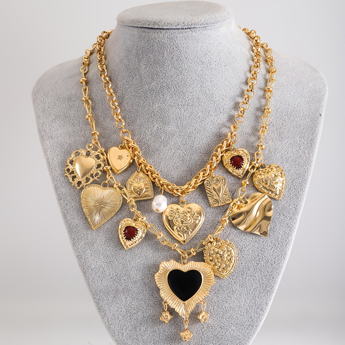 Vintage and elegant alloy necklace set featuring two pieces. This set includes a multi-layered pendant with heart and floral tassel designs, perfect for women who appreciate delicate jewelry. Suitable for wearing with evening gowns, at banquets, or for