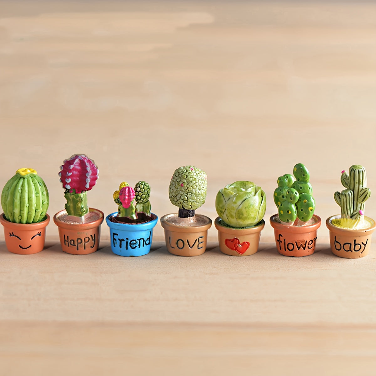 Miniature succulent and cactus fairy garden set with resin ornaments, ideal for small landscapes, desks, cakes, and gardens.