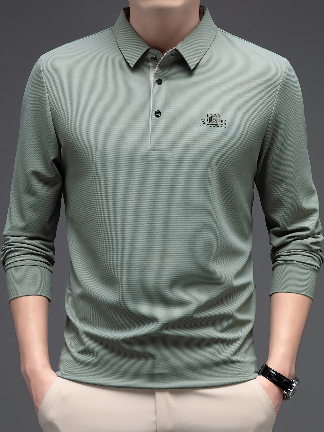 Men's lightweight long-sleeve shirt, ideal for golf and casual wear, made with breathable polyester blend.