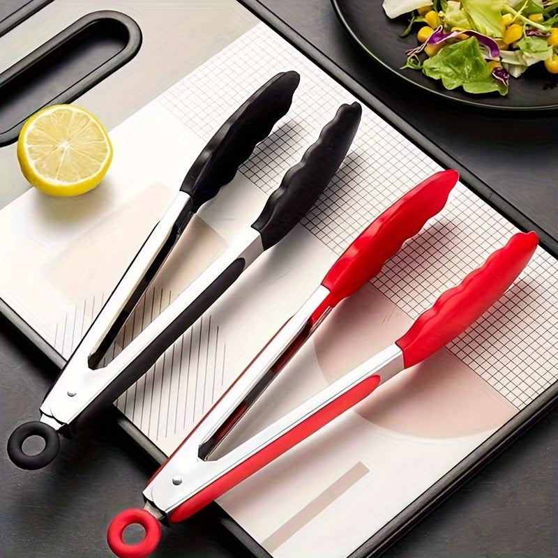 Black and red stainless steel kitchen tongs with heat-resistant silicone tips, available in three sizes (20.32 cm, 27.94 cm, 33.02 cm). These food clips feature a pull lock and non-scratch silicone tips, making them ideal for use with air fryers and