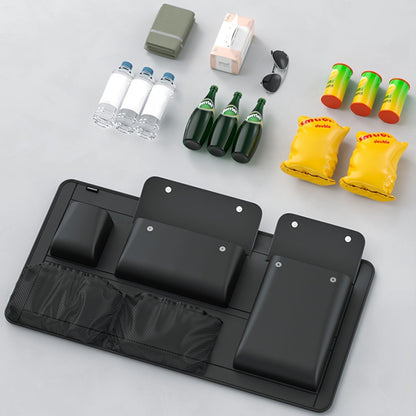 Car trunk storage bag for organizing miscellaneous items.