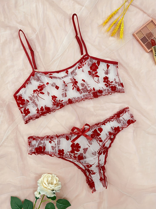 Lingerie set with floral print tulle, see-through bow bra, and tempting thong.