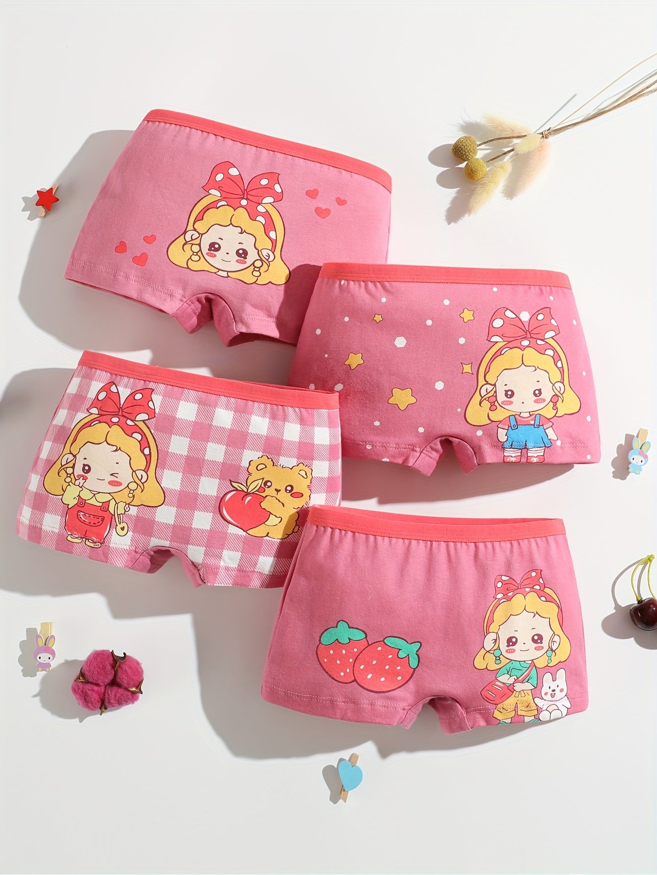 Soft, breathable cotton boxer briefs with cute cartoon print - perfect fit for young girls.