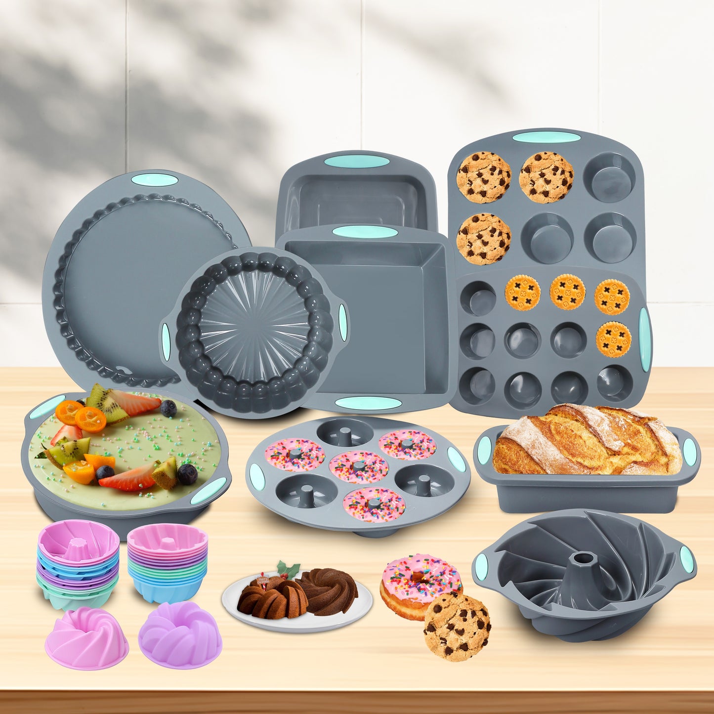 Silicone baking set includes 45 pieces, including various molds, pans, cups, and tools for the kitchen.