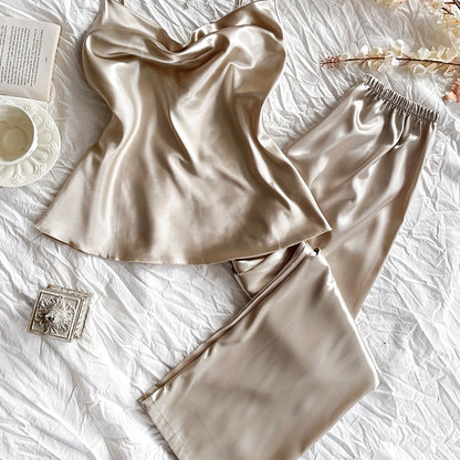 Solid satin pajama set with a sexy cowl neck, backless cami top, and relaxed fit pants for women.