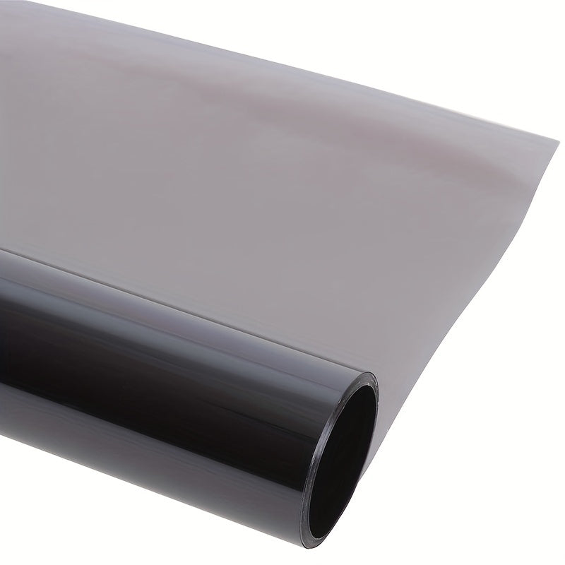 Black car window tint film roll for UV protection, measuring 300cmx50cm/118.11inx19.69in, suitable for both cars and homes.